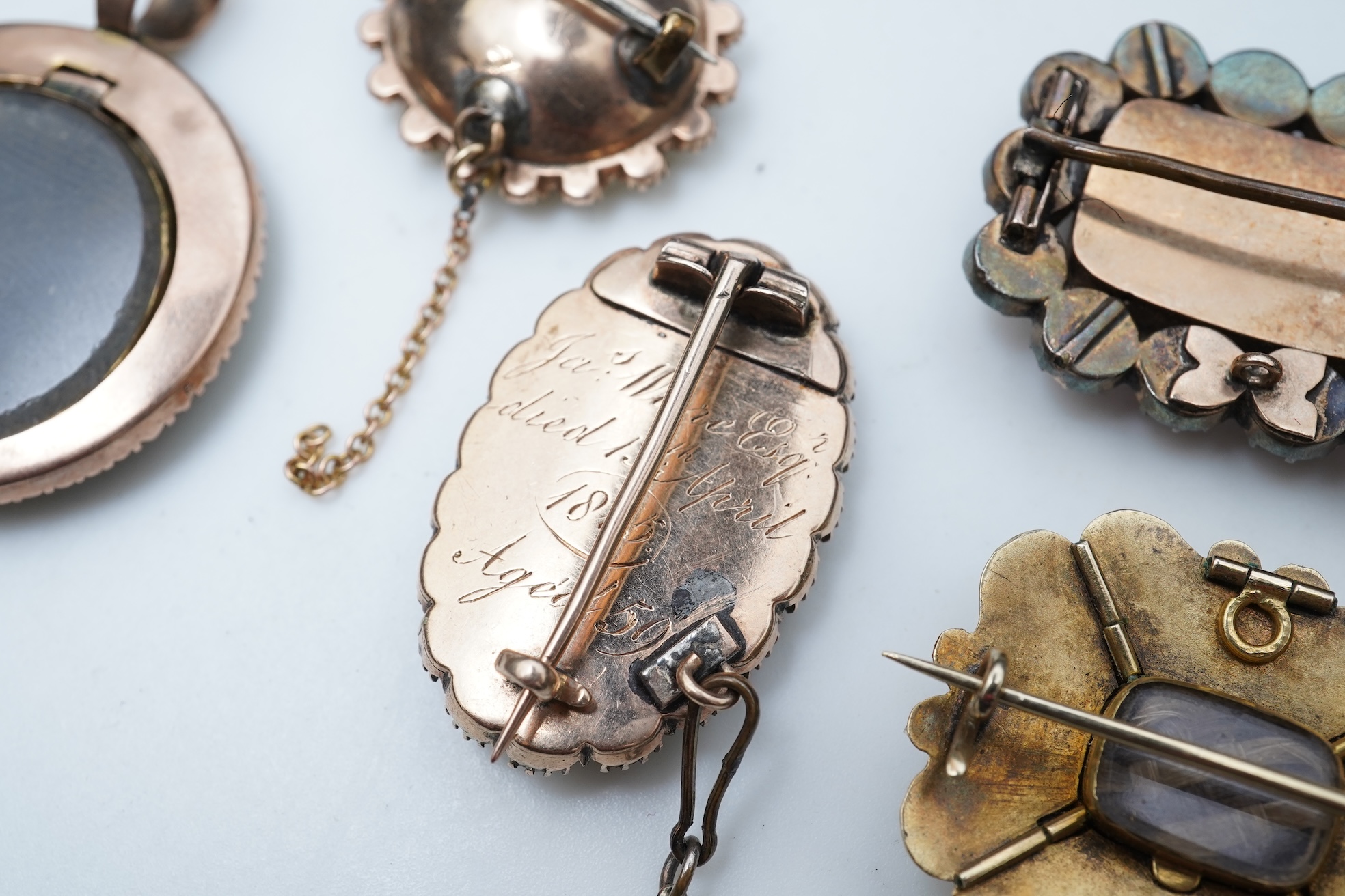 A collection of five Georgian/Victorian brooches, circa 1800-1900